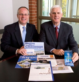 John Spevak, left, chairman of the CAN DO Board of Directors, and W. Kevin O’Donnell, CAN DO president, hold some of the publications that won awards at the 2009 Northeastern Economic Developers Association Literature & Promotions Competition.