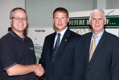 Adam Hoover, center, celebrated five years with CAN DO in July. Adam is Assistant Director of Operations.