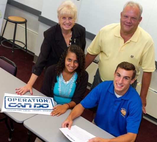 Front row, from left: Operation: CAN DO co-chairs Monica Abdelmalek of Hazleton Area High School and Dominic Mussoline of Marian High School. At back are student advisers Nancy Stasko, CAN DO director of administration, and Charles Burkhardt, CAN DO board member.
